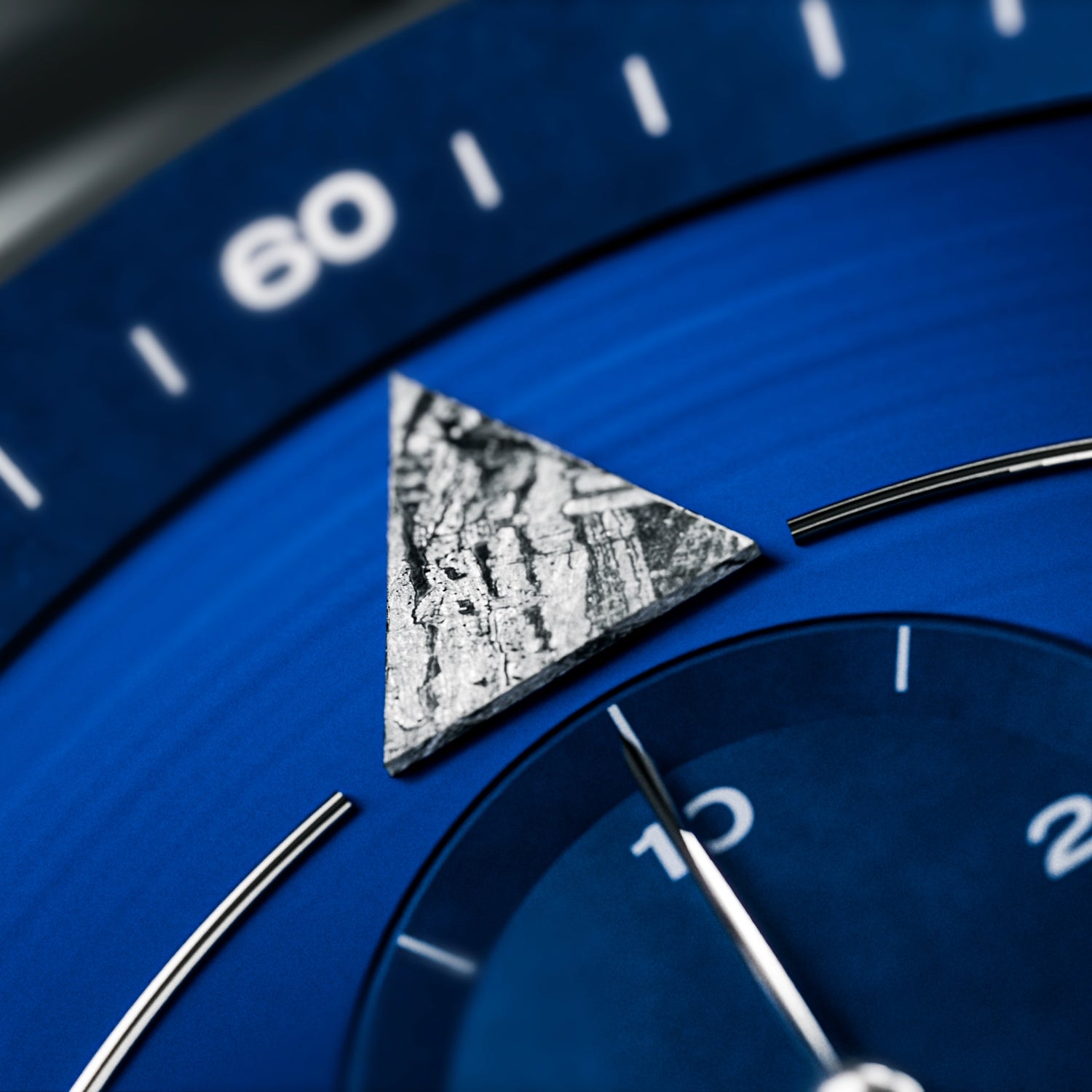 Blue Dot Limited Edition watch with meteorite accents, sleek silver bracelet, and blue dial design.
