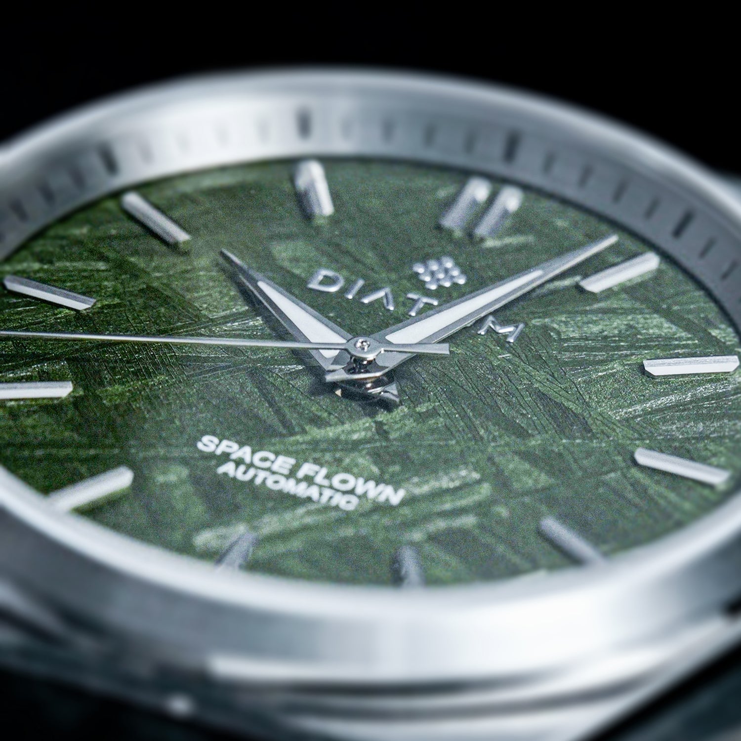 Green Meteorite watch macro shot