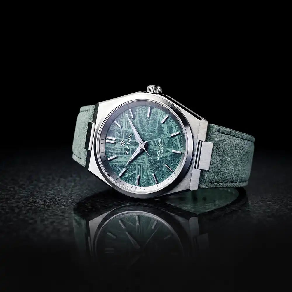 Turqoise Meteorite Watch on flat surface